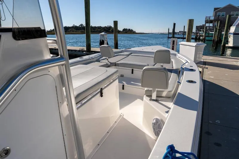 Slide: The Image of Manufacturer Provided Image: 2025 Bay Rider 269 Bay boat docked, featuring spacious seating and sleek design. - 9