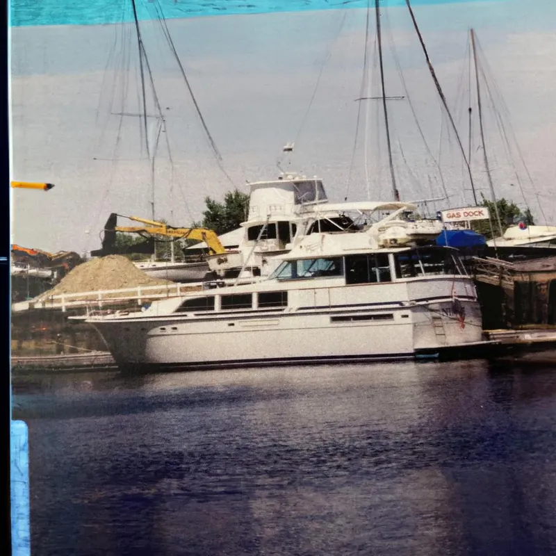 The Image of 1985 Bertram 58 Flybridge Motor Yacht docked at harbor. - 0