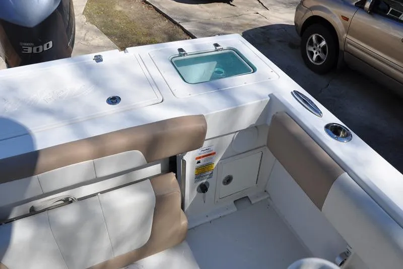 Slide: The Image of 2018 Parker 2300 Center Console boat interior with seating and storage compartments. - 10