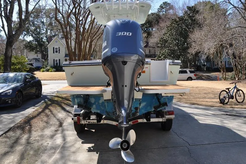 Slide: The Image of 2018 Parker 2300 Center Console boat with Yamaha 300 engine on trailer. - 2