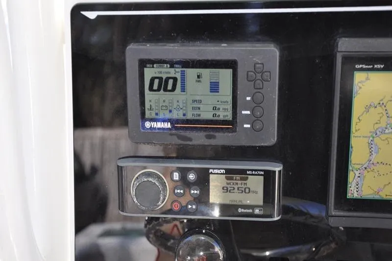 Slide: The Image of Dashboard of a 2018 Parker 2300 Center Console with Yamaha and Fusion displays. - 21