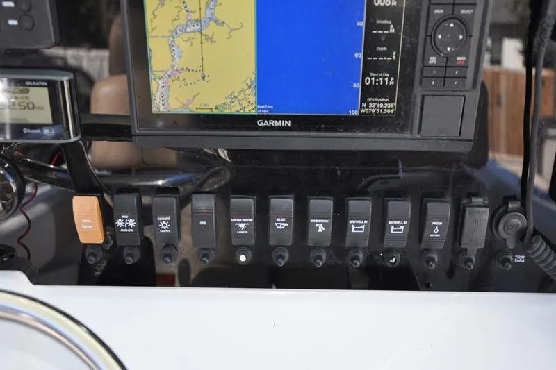 Slide: The Image of Control panel of a 2018 Parker 2300 Center Console boat with Garmin navigation system. - 23