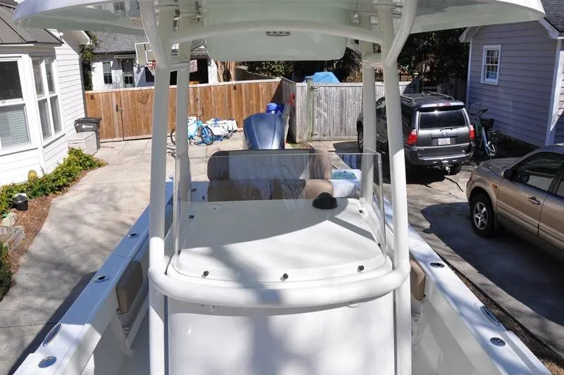 Slide: The Image of 2018 Parker 2300 Center Console boat parked in a residential driveway. - 38