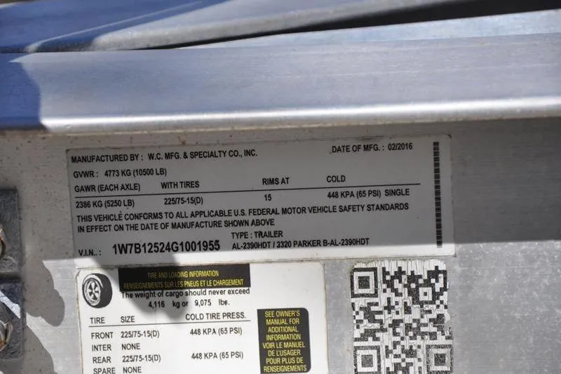 Slide: The Image of Label on Parker 2300 Center Console trailer, detailing specifications and safety standards. - 45