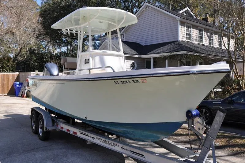 Slide: The Image of 2018 Parker 2300 Center Console boat on trailer in residential driveway. - 5