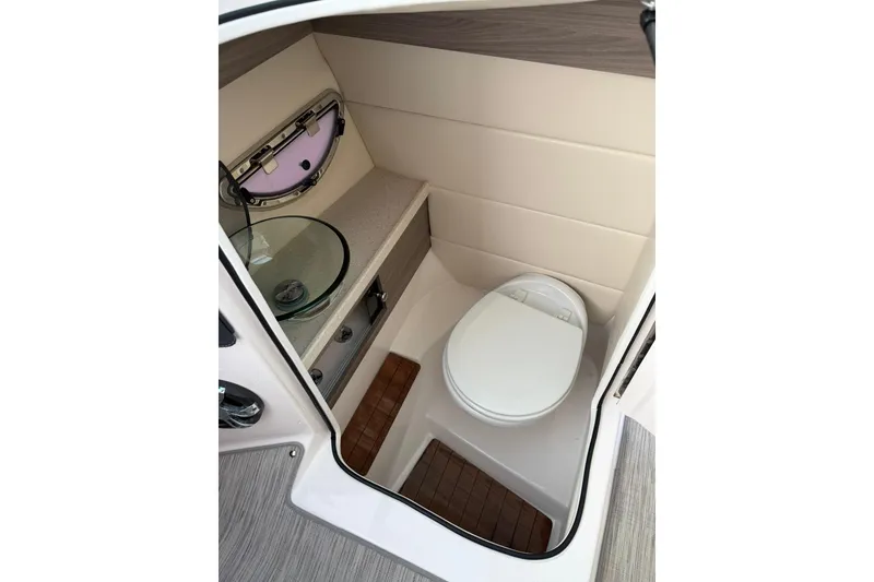 Slide: The Image of 2019 Regal 29 OBX boat bathroom with modern fixtures and compact design. - 33