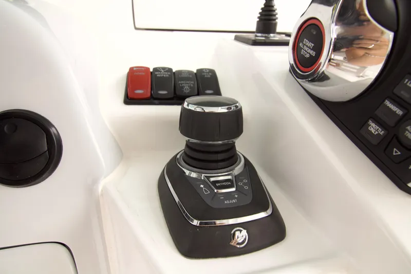 Slide: The Image of Control panel of 2027 HCB 42 Lujo boat with joystick and buttons. - 4