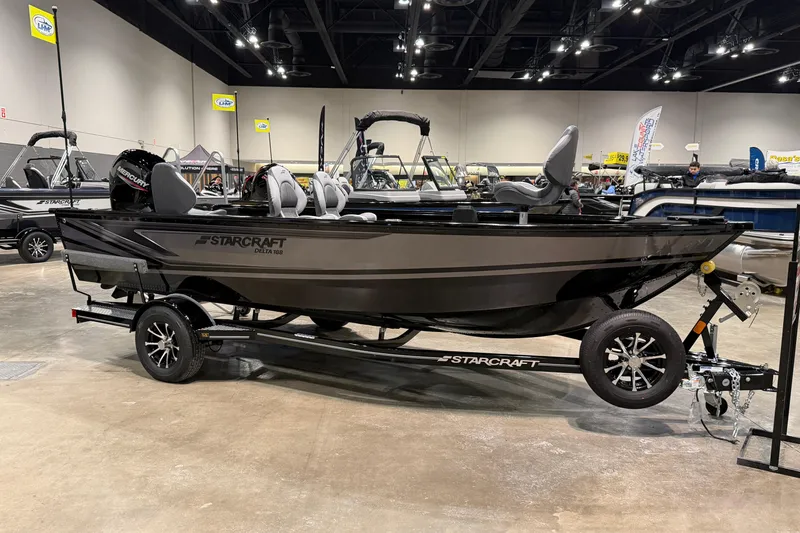 The Image of 2026 Starcraft Delta 188 T boat on display in an indoor showroom. - 0