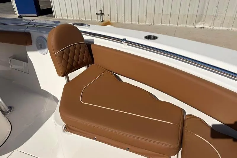 Slide: The Image of Luxurious brown seating on 2025 Key West 239 FS boat, featuring elegant stitching and design. - 19
