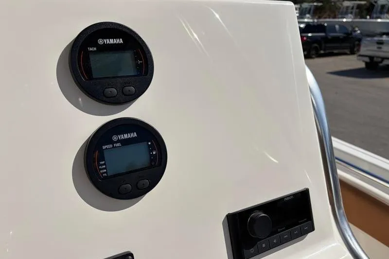 Slide: The Image of Yamaha gauges on 2025 Key West 239 FS boat dashboard, displaying tachometer and speed fuel indicators. - 28