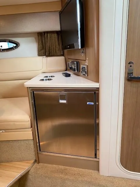 Slide: The Image of Interior of 2012 Formula 350 Sun Sport with modern kitchenette and seating area. - 17
