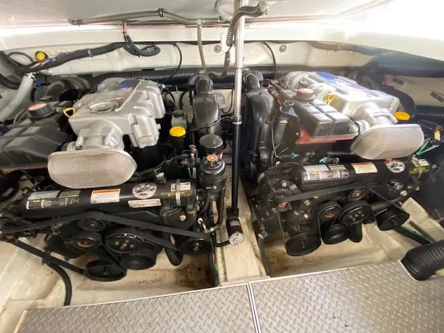 Slide: The Image of Engine compartment of a 2012 Formula 350 Sun Sport boat, featuring dual engines. - 30