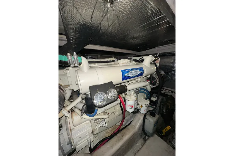 Slide: The Image of Engine room of 2005 Sea Ray 420 Sedan Bridge with Diamond Performance engine. - 15