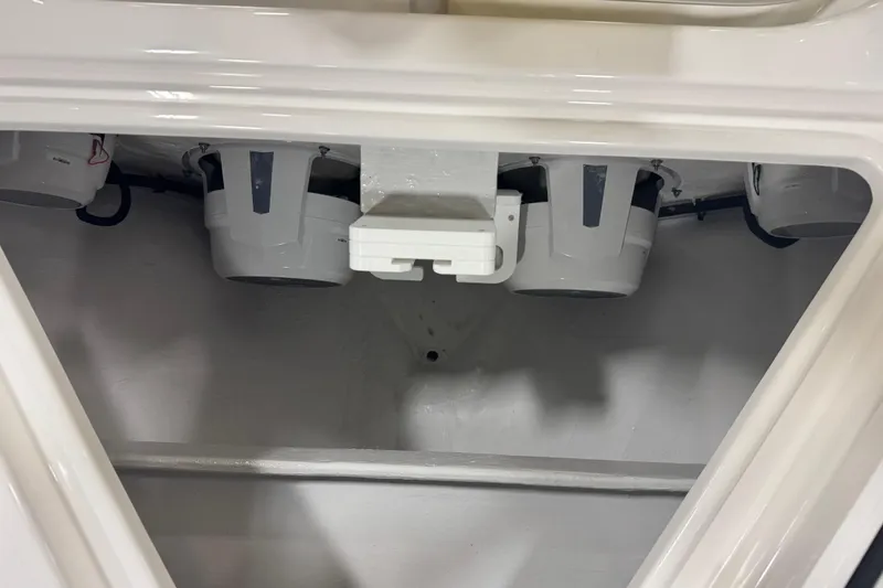 Slide: The Image of 2026 Contender 39 ST boat interior compartment with visible components. - 16