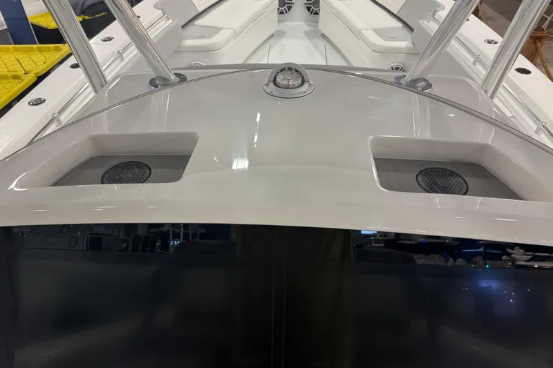 Slide: The Image of 2026 Contender 39 ST boat dashboard with speakers and sleek design. - 25