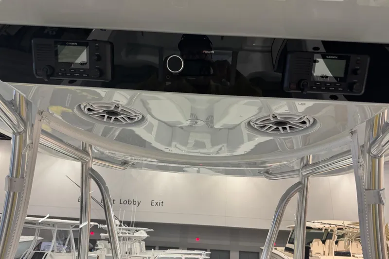 Slide: The Image of 2026 Contender 39 ST boat interior with Garmin electronics and Fusion audio system. - 26