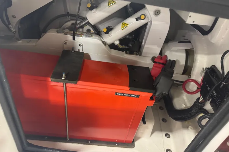 Slide: The Image of Engine compartment of 2026 Contender 39 ST with Seakeeper stabilizer system. - 30