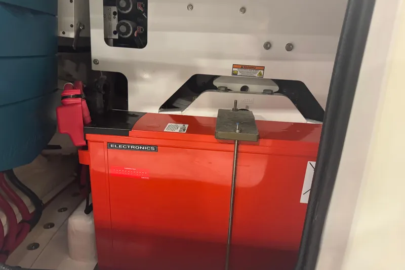 Slide: The Image of Interior view of 2026 Contender 39 ST electronics compartment with red panel. - 31