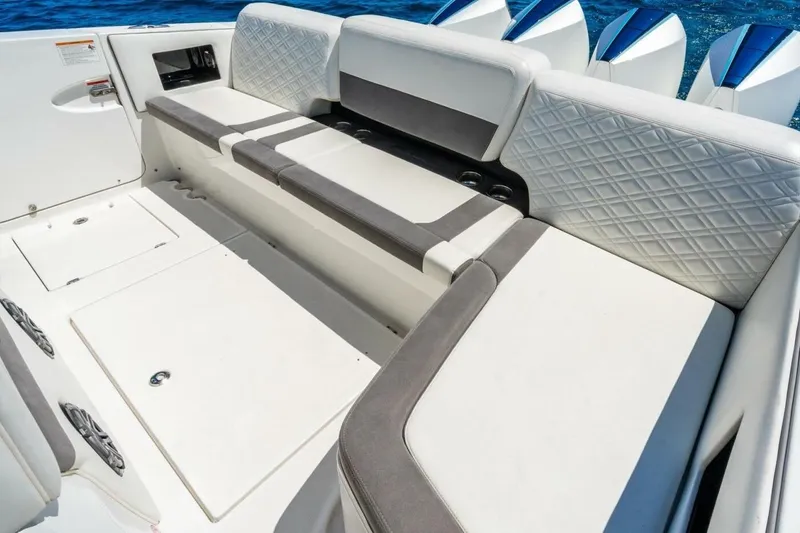 Slide: The Image of Luxurious seating on 2019 Cigarette 41' GTR boat with quilted upholstery. - 11