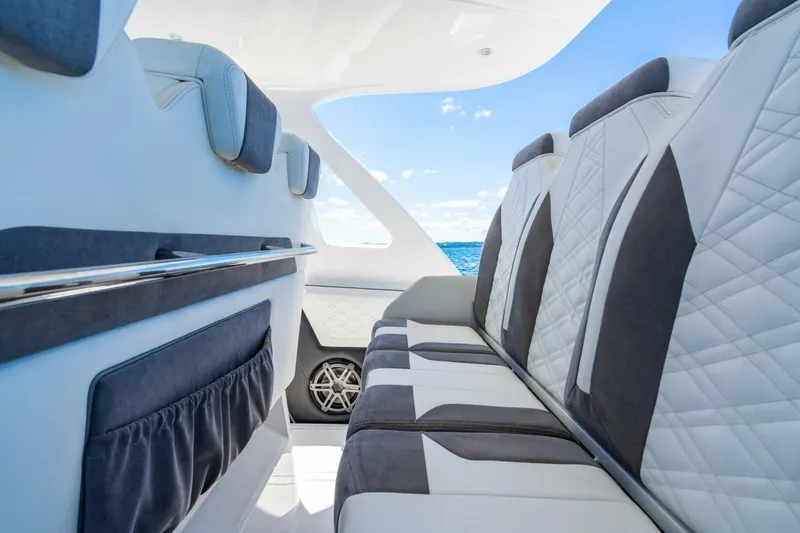 Slide: The Image of Luxurious interior of 2019 Cigarette 41' GTR boat with stylish seating and ocean view. - 13