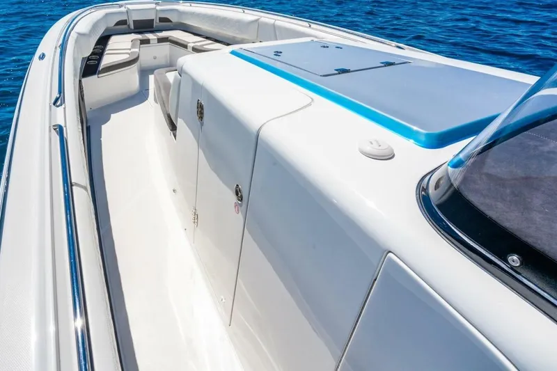 Slide: The Image of 2019 Cigarette 41' GTR boat with sleek design on open water. - 19