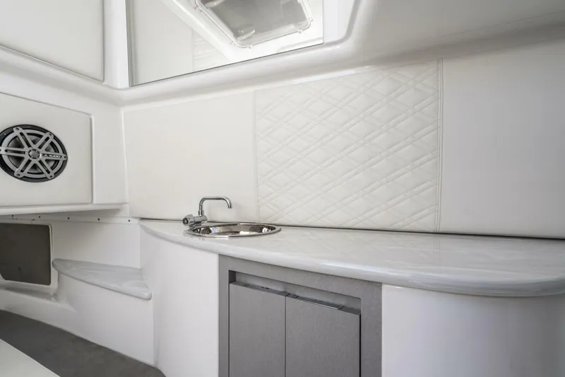 Slide: The Image of Interior of 2019 Cigarette 41' GTR boat with sink and speaker. - 29