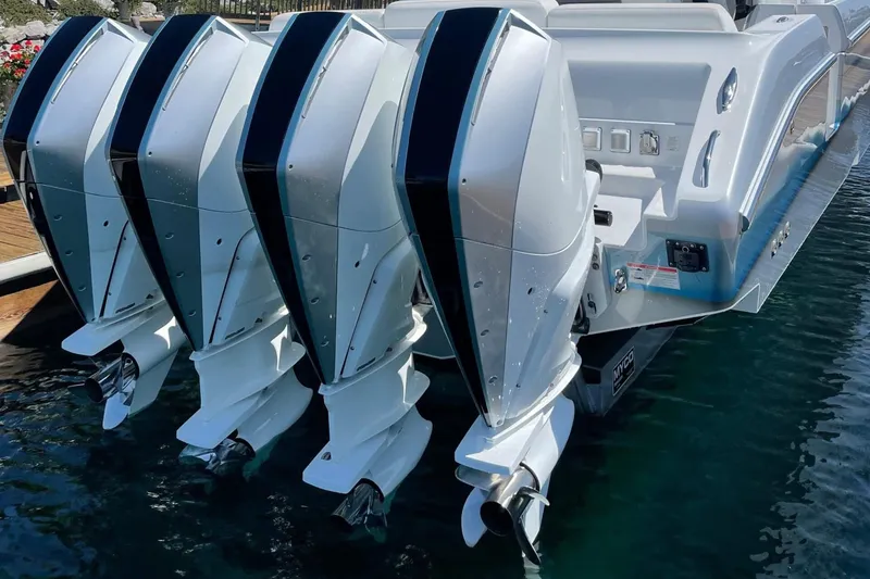 Slide: The Image of 2019 Cigarette 41' GTR boat with four powerful outboard engines. - 7