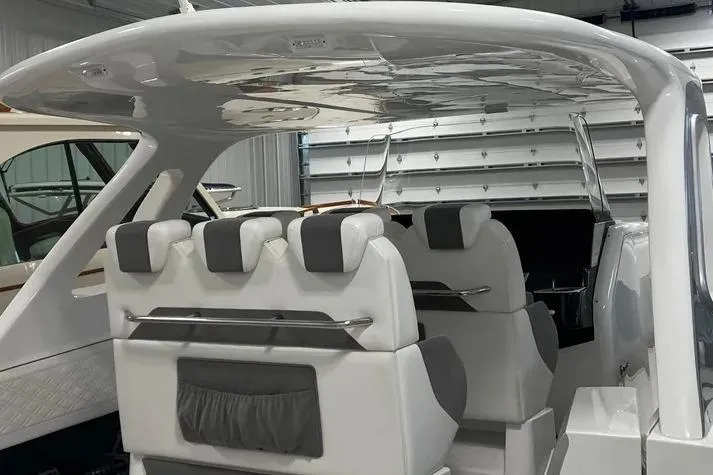Slide: The Image of 2019 Cigarette 41' GTR boat interior with sleek seating and modern design. - 8
