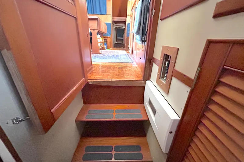 Slide: The Image of Interior view of 1988 Grand Banks 36 Classic yacht with wooden steps and paneling. - 41