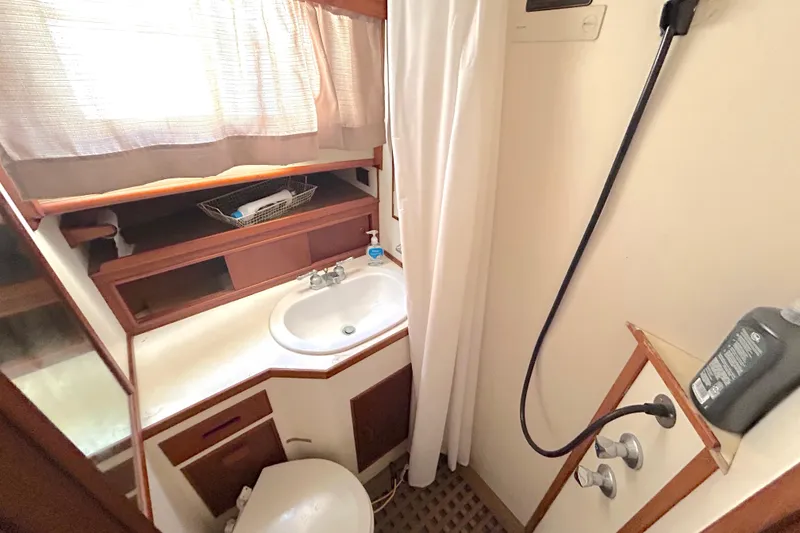Slide: The Image of Bathroom interior of 1988 Grand Banks 36 Classic yacht, featuring sink and shower. - 42