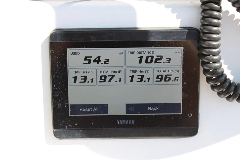 Slide: The Image of Yamaha display showing fuel usage and trip data on 2022 Tidewater 272 CC Adventure boat. - 43