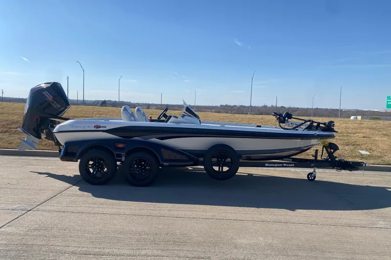 Slide: The Image of 2026 Ranger Z520 boat on trailer, parked on a sunny day. - 3