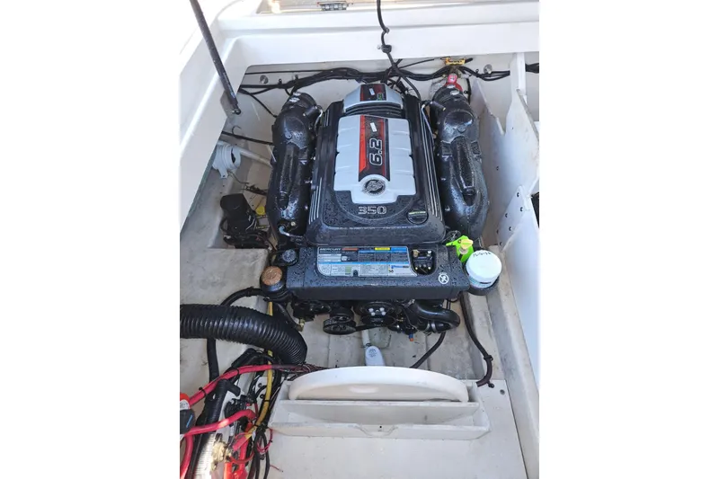 Slide: The Image of Engine compartment of a 2009 Searay 260 boat, featuring a 6.2L engine. - 11