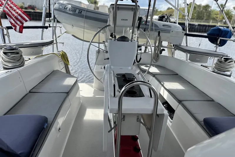 Slide: The Image of Cockpit of 2005 Catalina Morgan 440 sailboat with seating and equipment. - 57