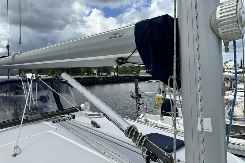 Slide: The Image of Sailboat deck view of 2005 Catalina Morgan 440 with rigging and boom details. - 65