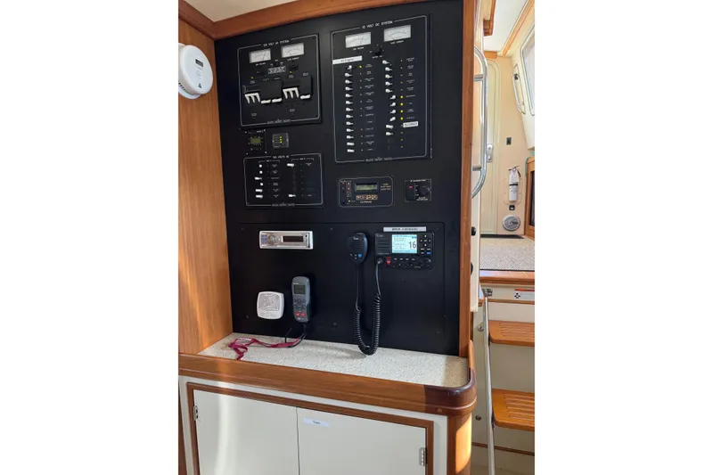Slide: The Image of Electrical control panel on 2008 Island Packet SP Cruiser yacht interior. - 16