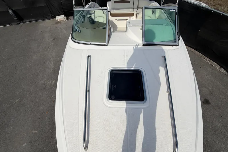 Slide: The Image of 2014 Chaparral 225 SSi boat deck with open windshield and shadow. - 39