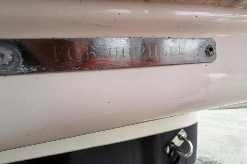 Slide: The Image of Hull identification number on a 2014 Chaparral 225 SSi boat. - 58