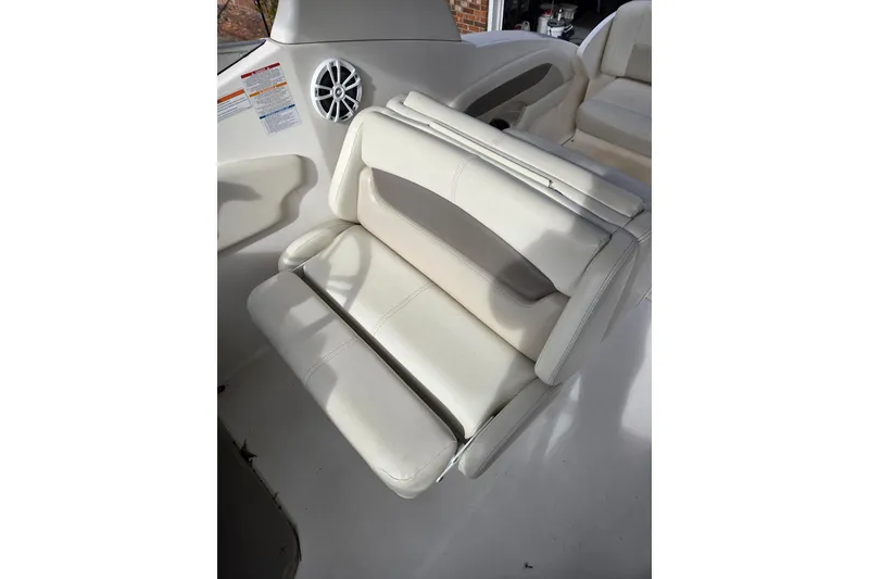 Slide: The Image of White leather seating on 2008 Chaparral Signature 250 boat interior. - 14