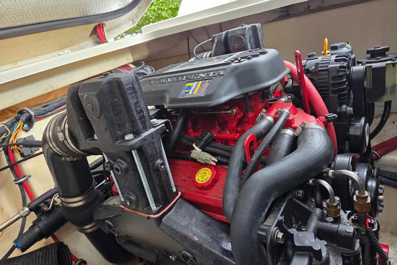 Slide: The Image of Engine of 2008 Chaparral Signature 250 boat, featuring Volvo Penta components. - 3