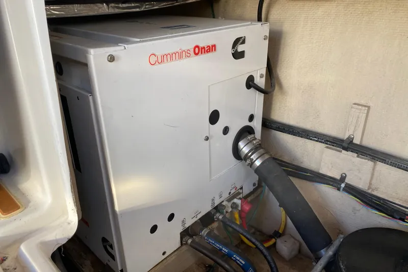 Slide: The Image of Cummins Onan generator in 2013 Ranger Tugs R-29 S boat engine compartment. - 21