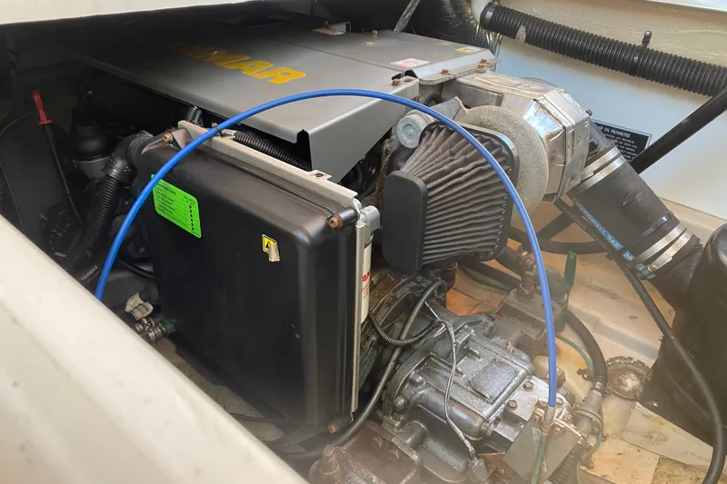 Slide: The Image of Engine compartment of 2013 Ranger Tugs R-29 S, featuring Yanmar components. - 22