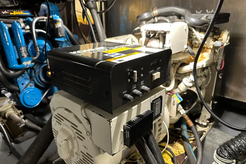 Slide: The Image of Engine room of 1995 Carver 440 Aft Cabin Motor Yacht with Kohler generator. - 42