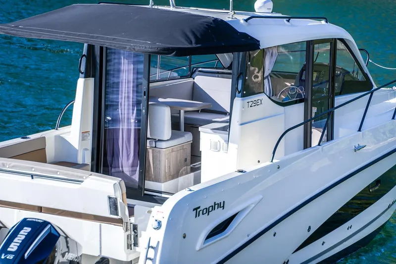 Slide: The Image of 2026 Trophy T29EX Explorer boat with sleek design and modern interior on water. - 8