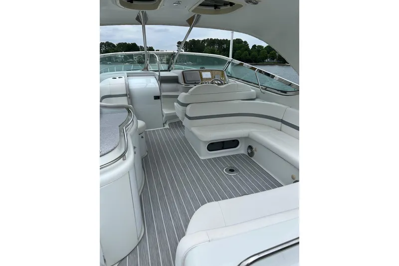 Slide: The Image of 2008 Formula 400 Super Sport yacht interior with sleek seating and modern dashboard. - 12