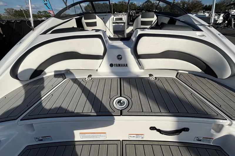 Slide: The Image of 2022 Yamaha Boats SX195 interior with sleek seating and modern design. - 15