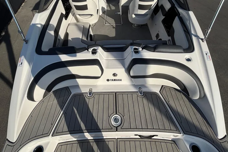 Slide: The Image of 2022 Yamaha Boats SX195 interior with sleek seating and modern design. - 18