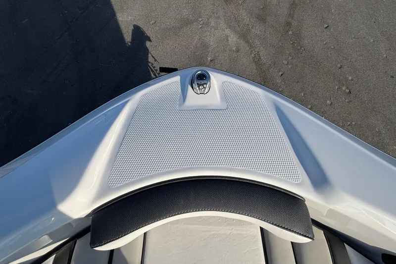 Slide: The Image of 2022 Yamaha Boats SX195 bow with textured surface and sleek design. - 46