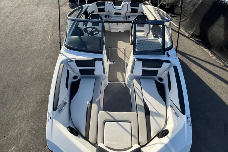 Slide: The Image of 2022 Yamaha Boats SX195 interior, featuring sleek seating and modern design elements. - 47
