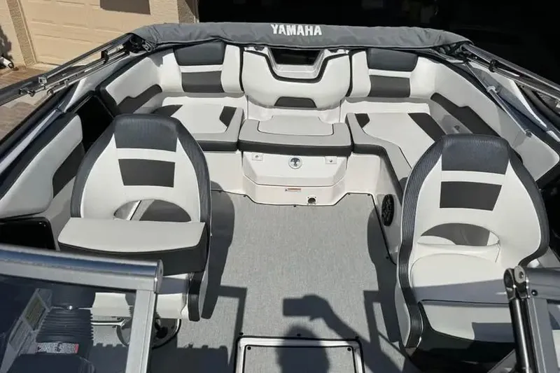 Slide: The Image of 2022 Yamaha Boats SX195 interior with modern seating and sleek design. - 5